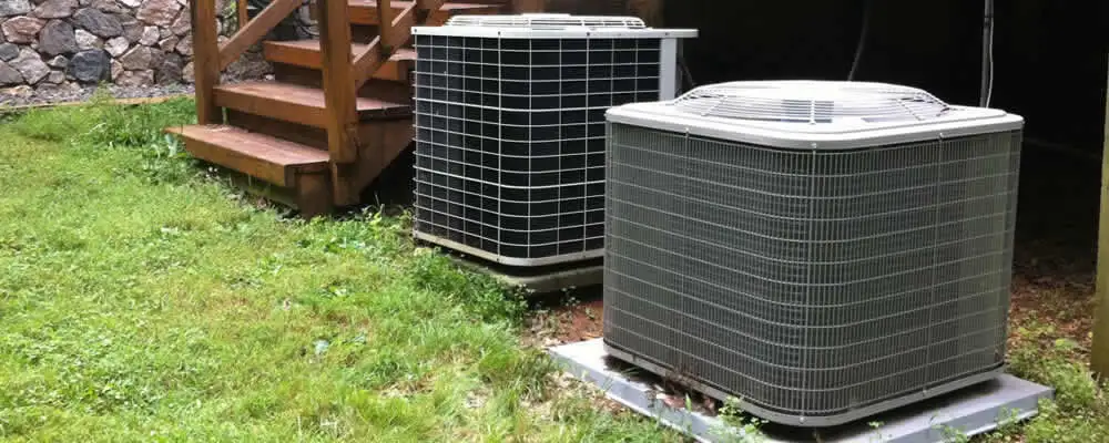 Heat pump installation and service units outside a home in Peoria, IL